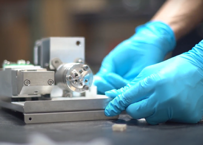 ZefSci servicing an analytical instrument