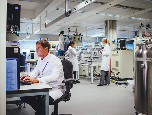 Group of medical science professionals working in a laboratory
