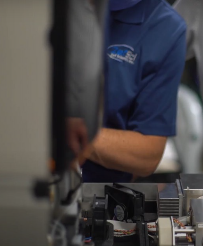 Engineer servicing lab instruments